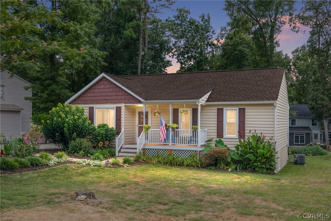 3130 Gregwood Road Midlothian, VA 23112 - Photo 1 of 39 a front view of a house with a yard
