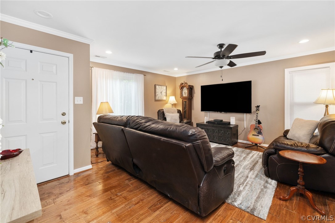 3130 Gregwood Road Midlothian, VA 23112 - Photo 13 of 39 a living room with furniture and a flat screen tv