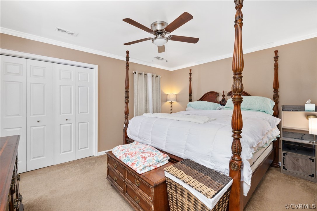 3130 Gregwood Road Midlothian, VA 23112 - Photo 28 of 39 a bedroom with a bed window and a ceiling fan