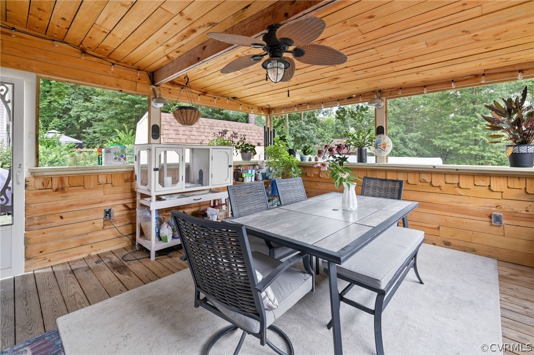 3130 Gregwood Road Midlothian, VA 23112 - Photo 31 of 39 a view of a patio with a table chairs and a backyard