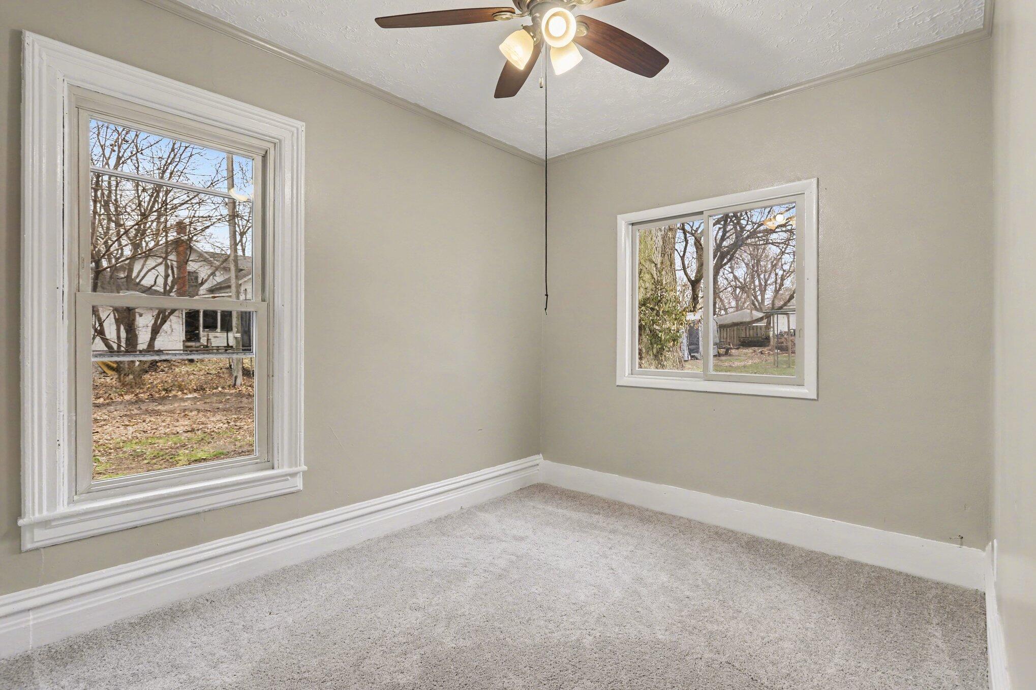 210 West Bennett Street Three Rivers, MI 49093 - Photo 8 of 17 4 Bed Unit - Main level bedroom