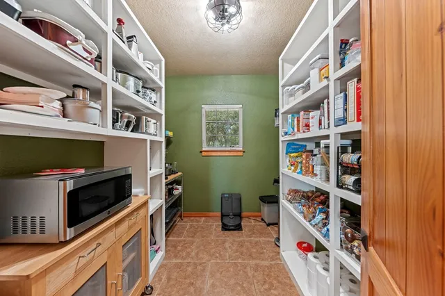 a room with storage and utility