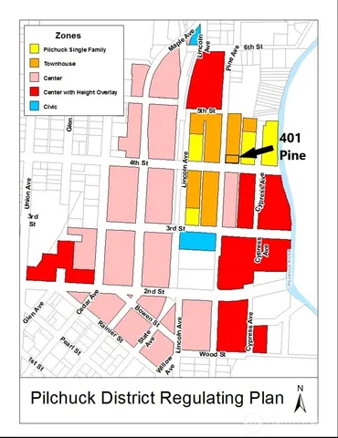 a utility room with a rug and a white walls