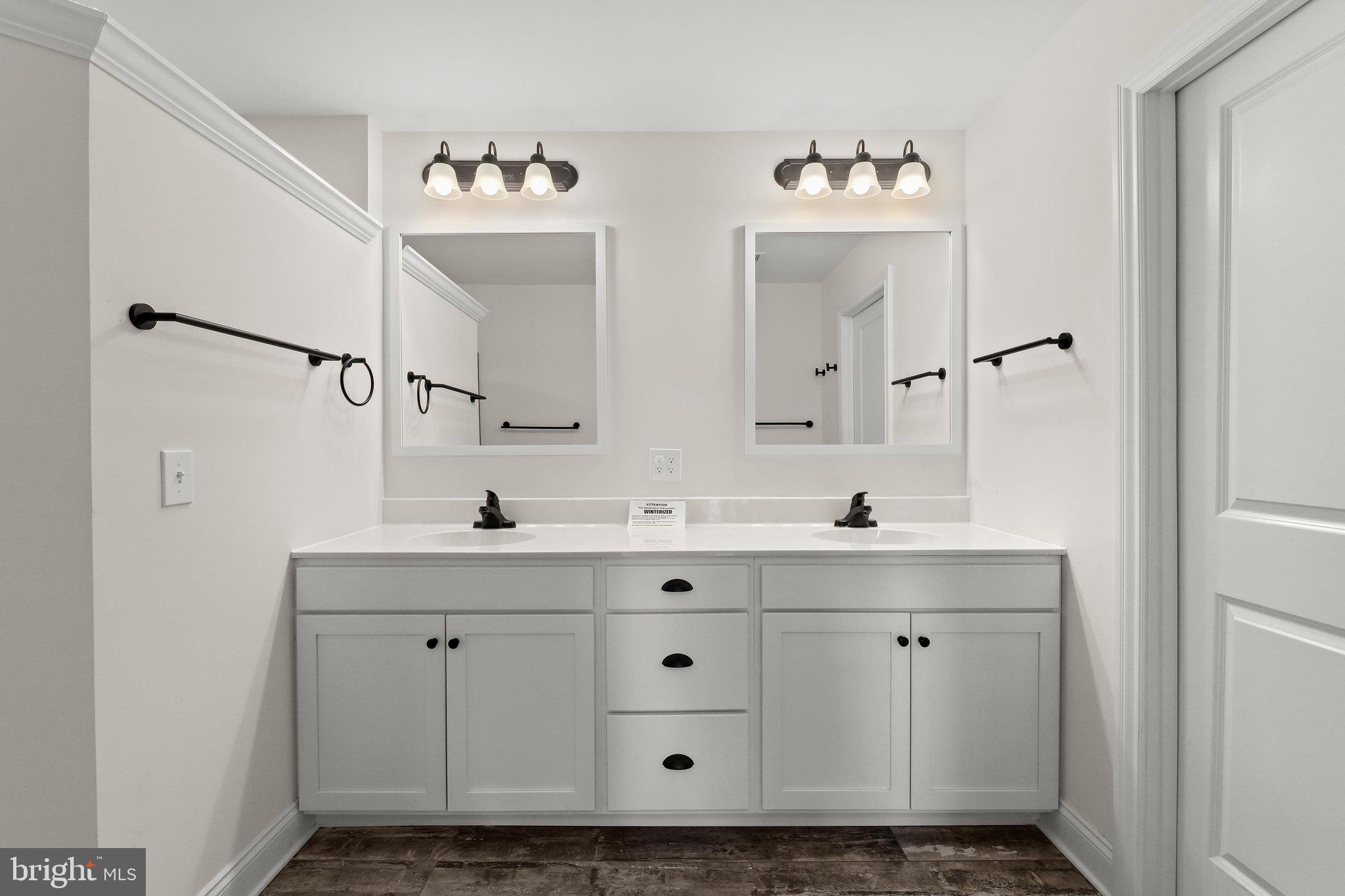 7832 Old Receiver Road Frederick, MD 21702 - Photo 29 of 57 a bathroom with a sink vanity and mirror