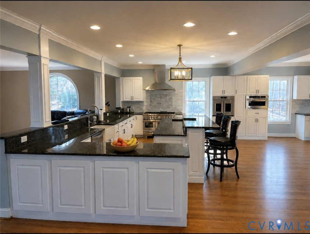 239 Jennings Road Cartersville, VA 23027 - Photo 8 of 26 Spacious kitchen featuring white cabinetry, dark s