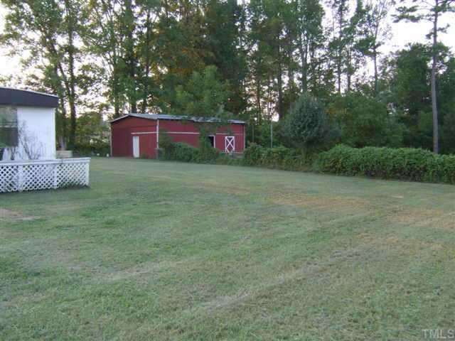 412 Jordan Narron Road Selma, NC 27576 - Photo 1 of 7 View of Land & Barn