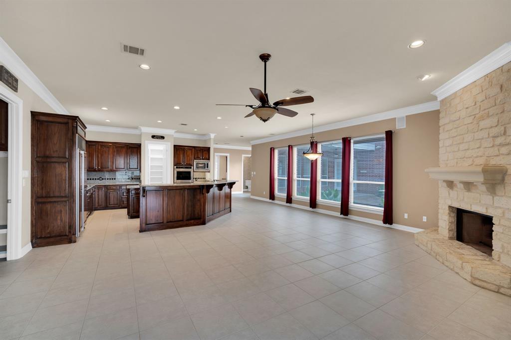 6420 Hayes Road Midlothian, TX 76065 - Photo 24 of 40 Kitchen with eat in area and living space