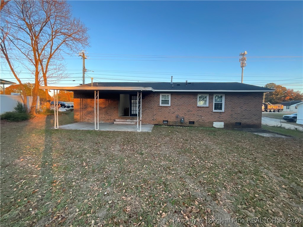 2238 Hope Mills Road Fayetteville, NC 28304 - Photo 9 of 9 a front view of a house with garden