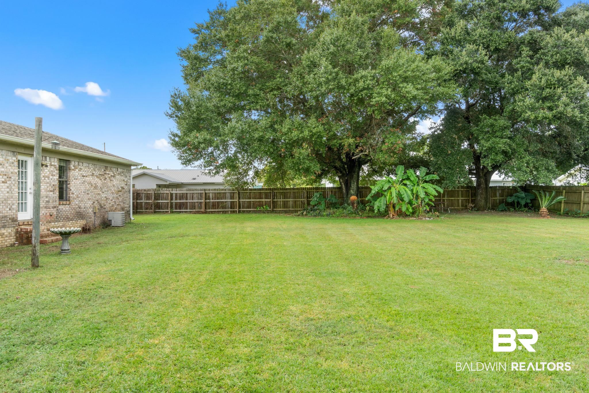 33135 Collier Road Lillian, AL 36549 - Photo 29 of 30 View of fenced backyard