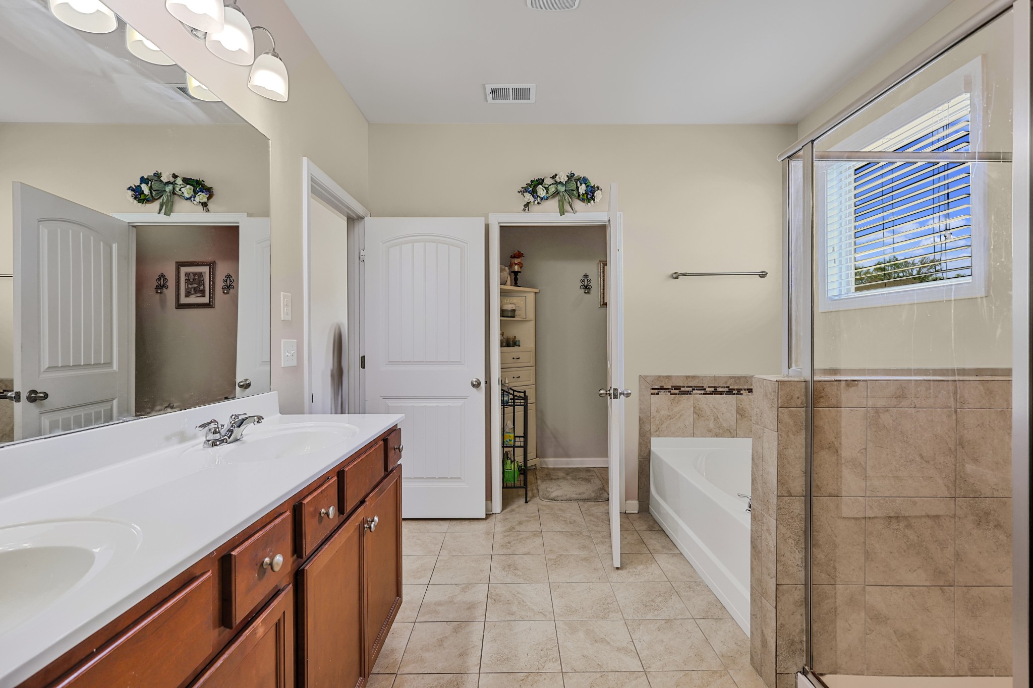 6515 Tulip Tree Drive Murfreesboro, TN 37128 - Photo 11 of 21 a spacious bathroom with a tub sink and mirror