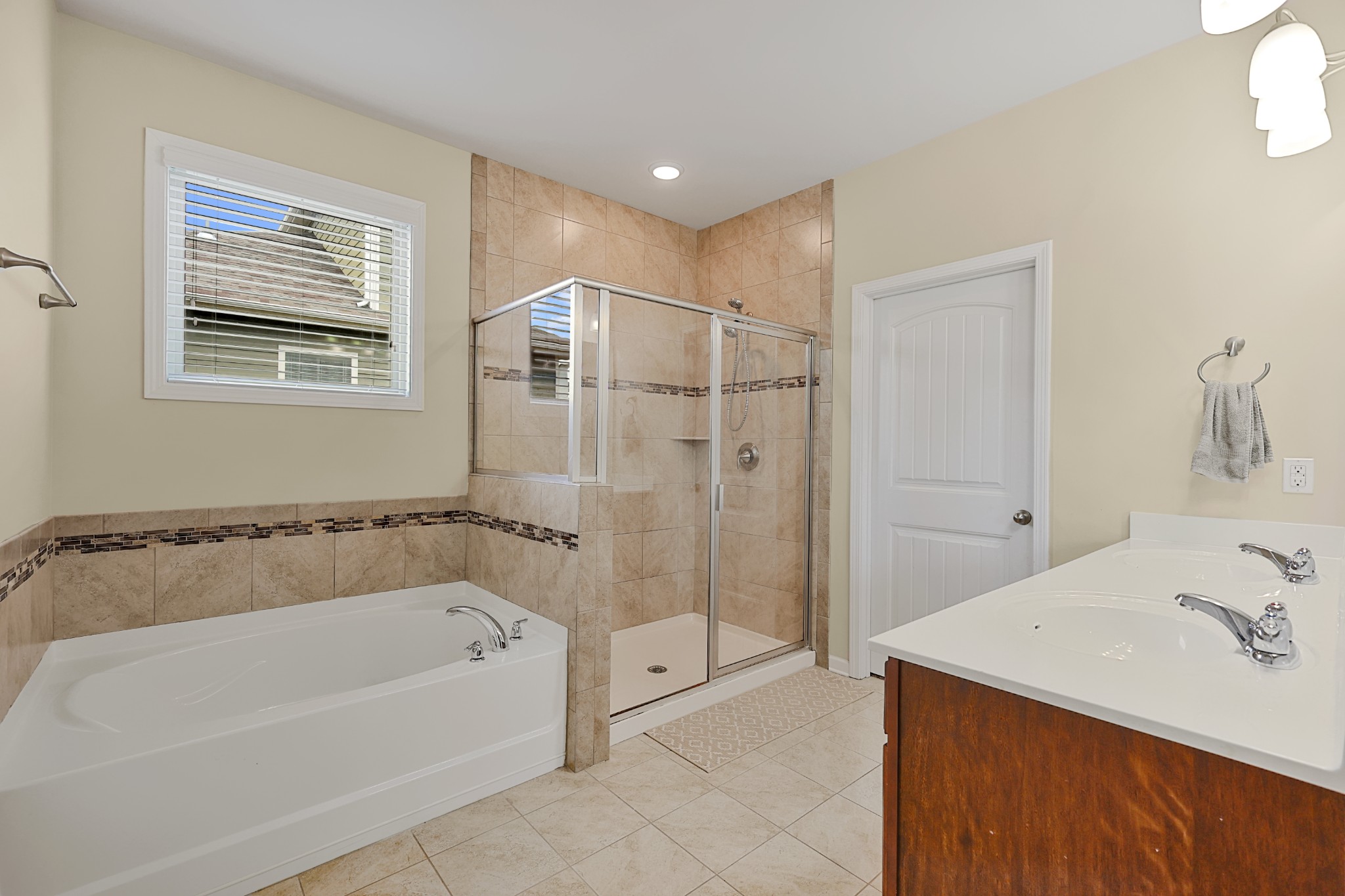 6515 Tulip Tree Drive Murfreesboro, TN 37128 - Photo 13 of 21 a bathroom with a bathtub and a shower