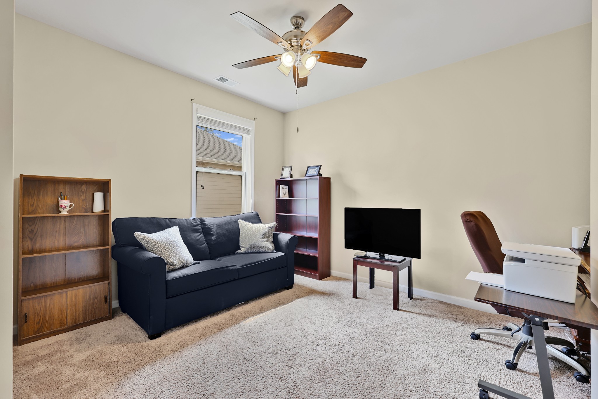6515 Tulip Tree Drive Murfreesboro, TN 37128 - Photo 14 of 21 a living room with furniture and a flat screen tv