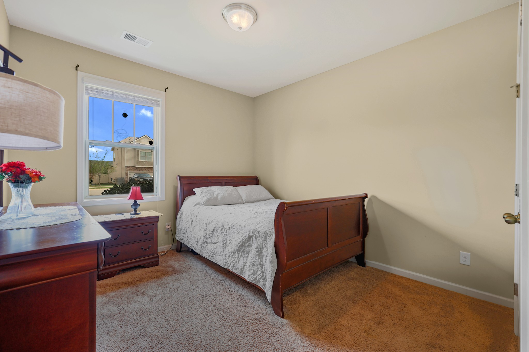 6515 Tulip Tree Drive Murfreesboro, TN 37128 - Photo 17 of 21 a bedroom with a bed and a dresser in it