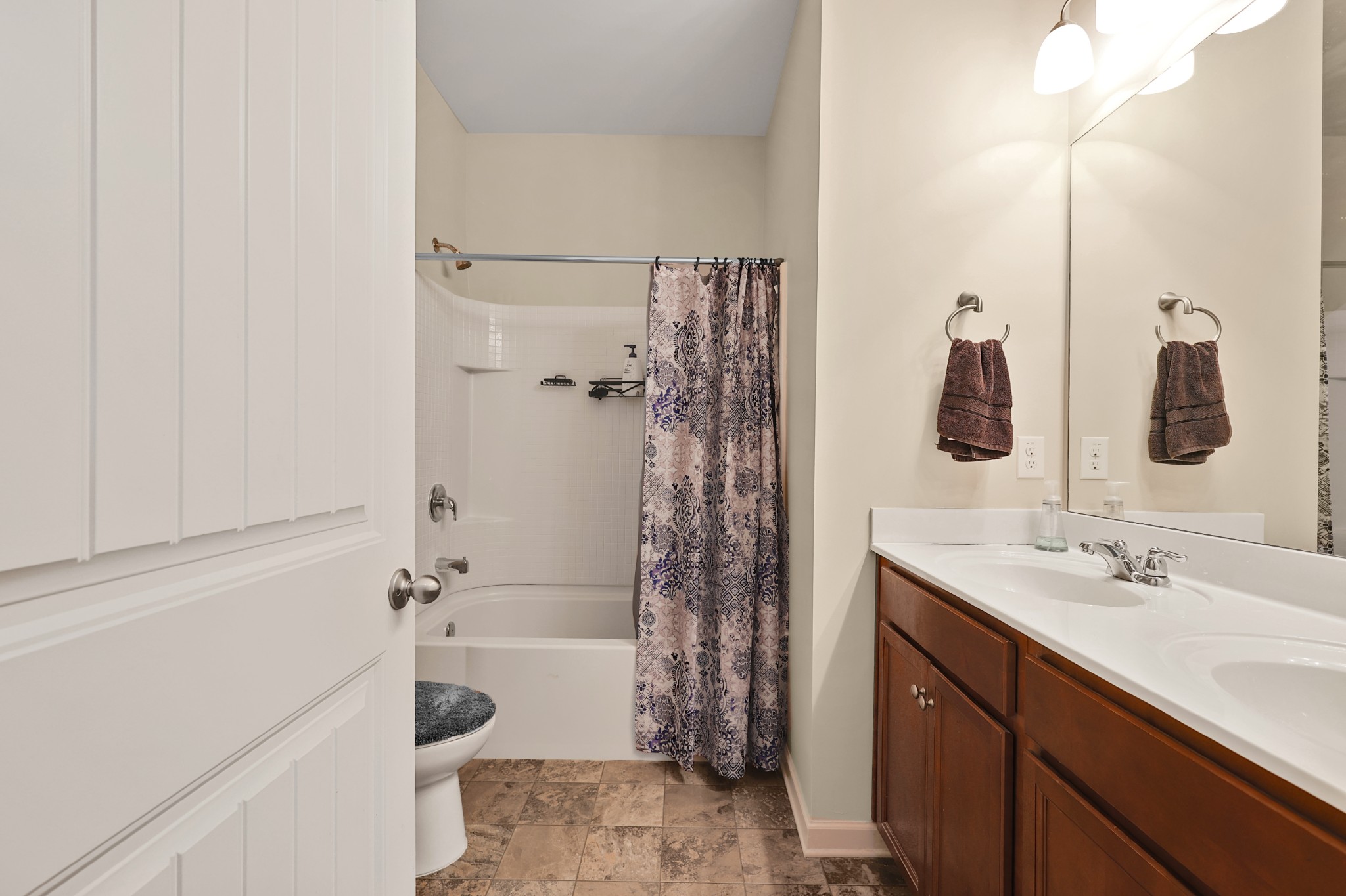 6515 Tulip Tree Drive Murfreesboro, TN 37128 - Photo 18 of 21 a bathroom with a sink a toilet and shower
