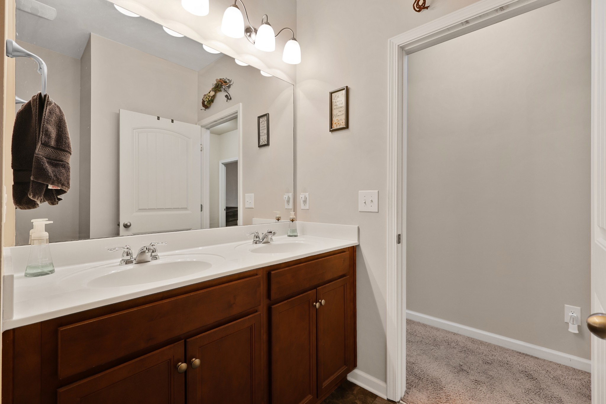 6515 Tulip Tree Drive Murfreesboro, TN 37128 - Photo 19 of 21 a bathroom with a double vanity sink and a mirror