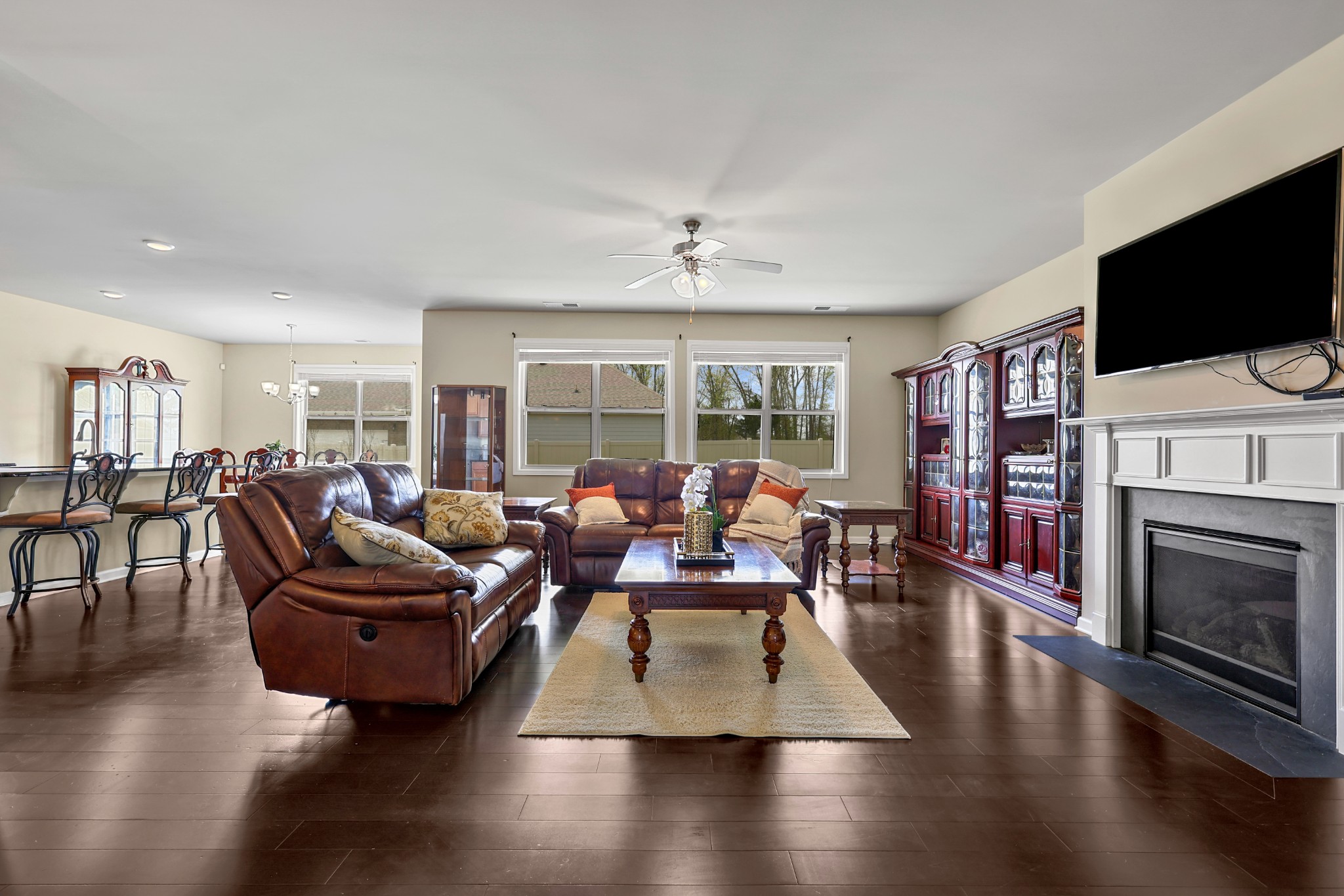 6515 Tulip Tree Drive Murfreesboro, TN 37128 - Photo 3 of 21 a living room with fireplace furniture and a flat screen tv