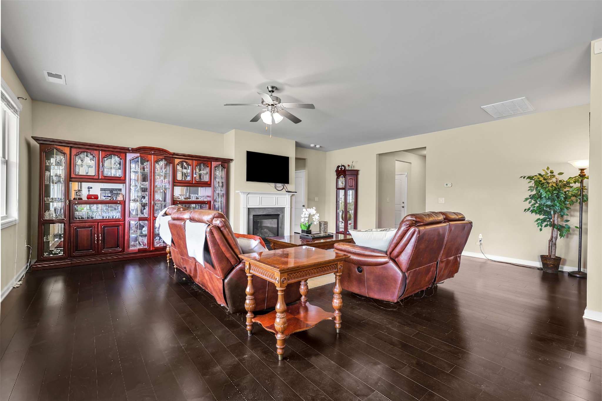 6515 Tulip Tree Drive Murfreesboro, TN 37128 - Photo 5 of 21 a living room with fireplace furniture and a wooden floor