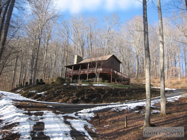 Lot # Bear Run Road Lansing, NC 28643 - Photo 5 of 7 a view of a house with yard