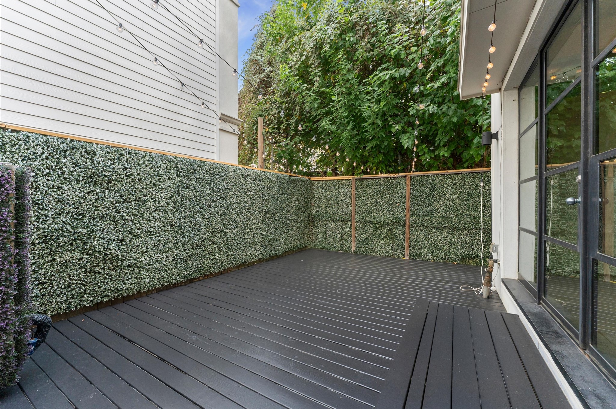 1902 West 25th Street Houston, TX 77008 - Photo 14 of 49 a view of a balcony with wooden floor and fence