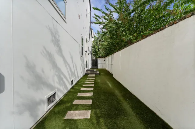 a view of balcony with yard