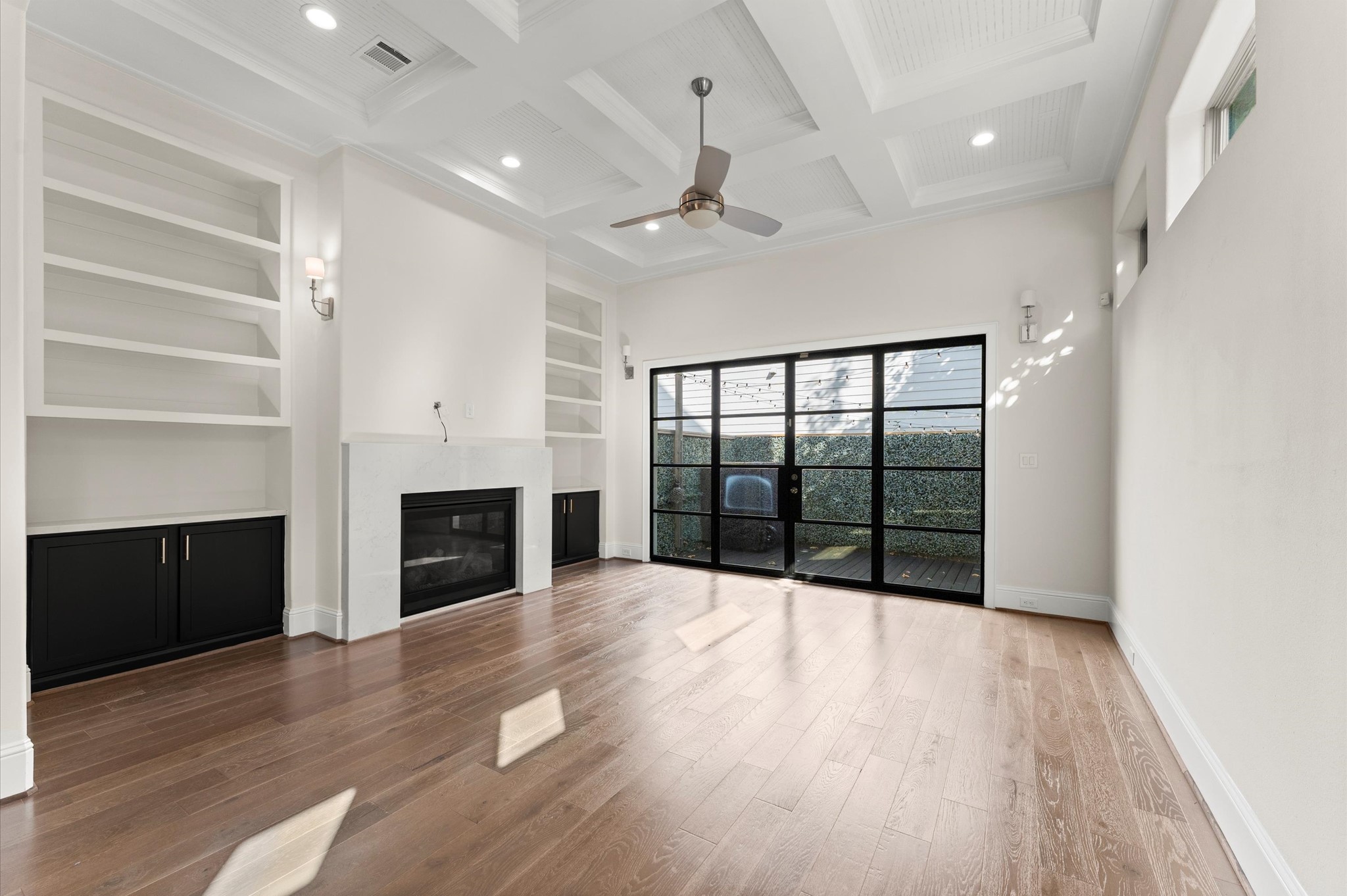1902 West 25th Street Houston, TX 77008 - Photo 23 of 49 a view of an empty room with a fireplace and a window