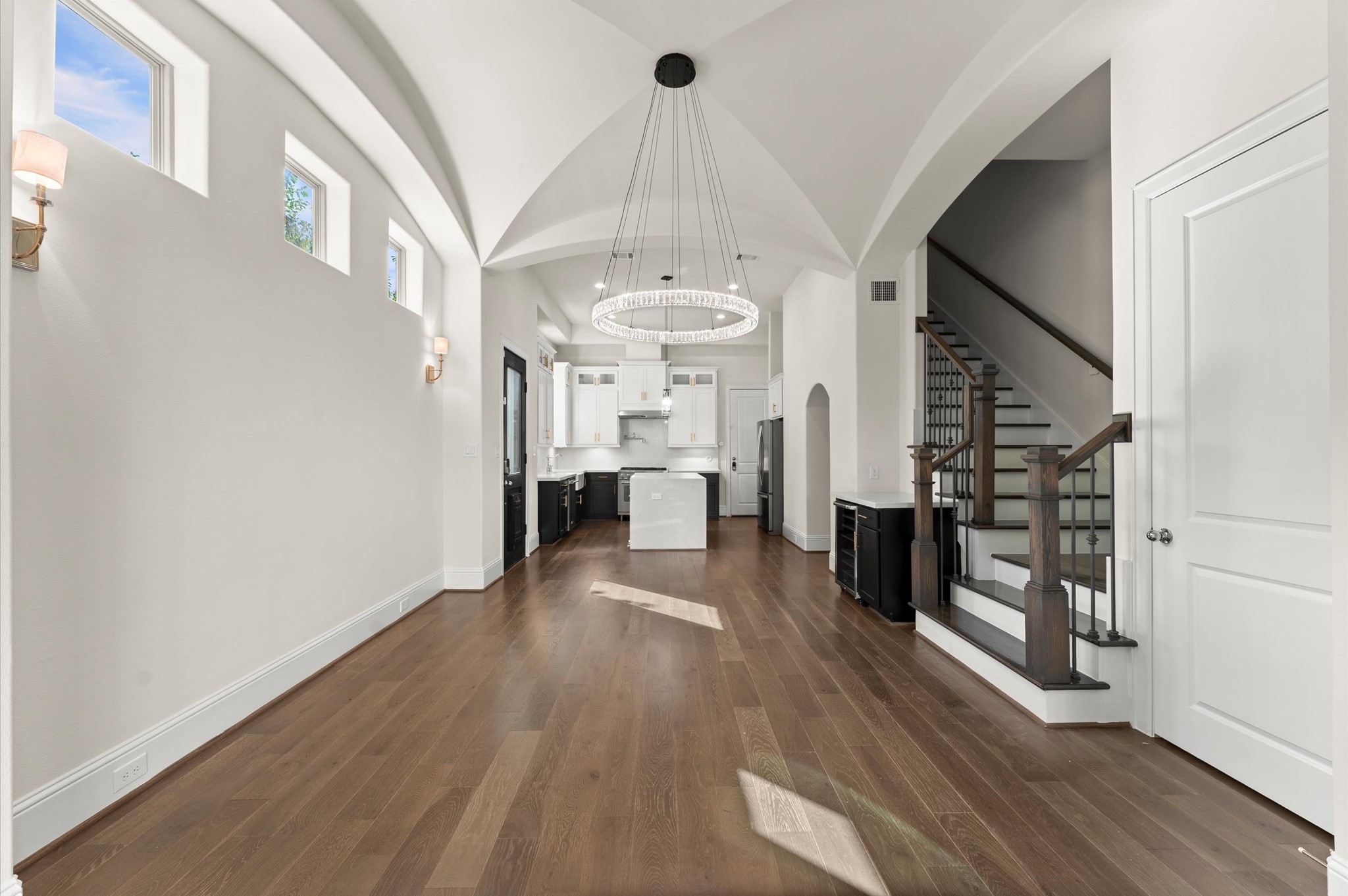1902 West 25th Street Houston, TX 77008 - Photo 27 of 49 a view of a hallway with wooden floor and staircase