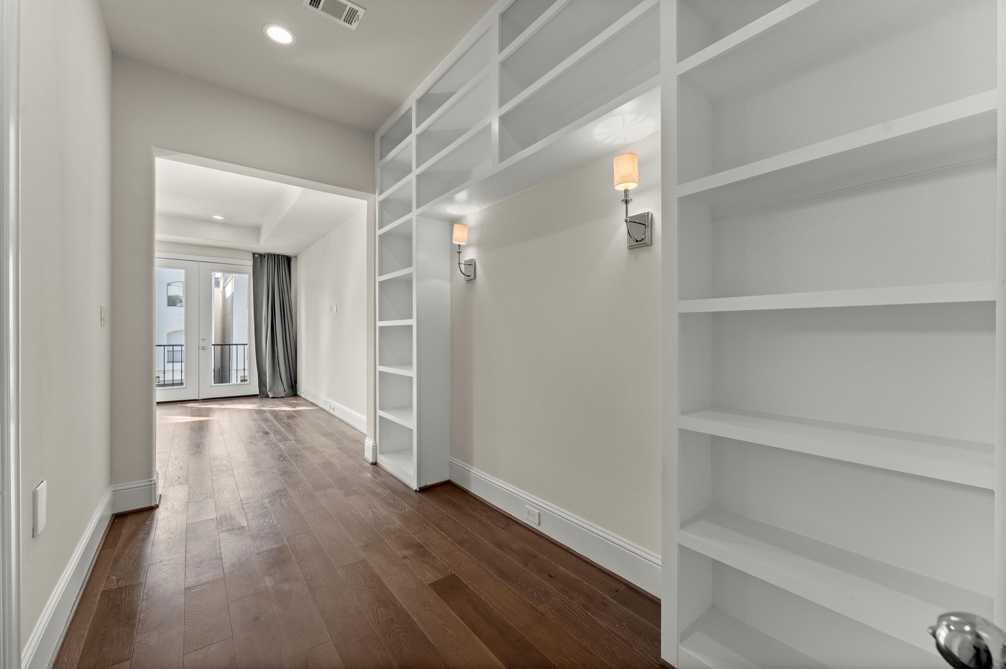 1902 West 25th Street Houston, TX 77008 - Photo 29 of 49 a view of empty room with wooden floor and fan