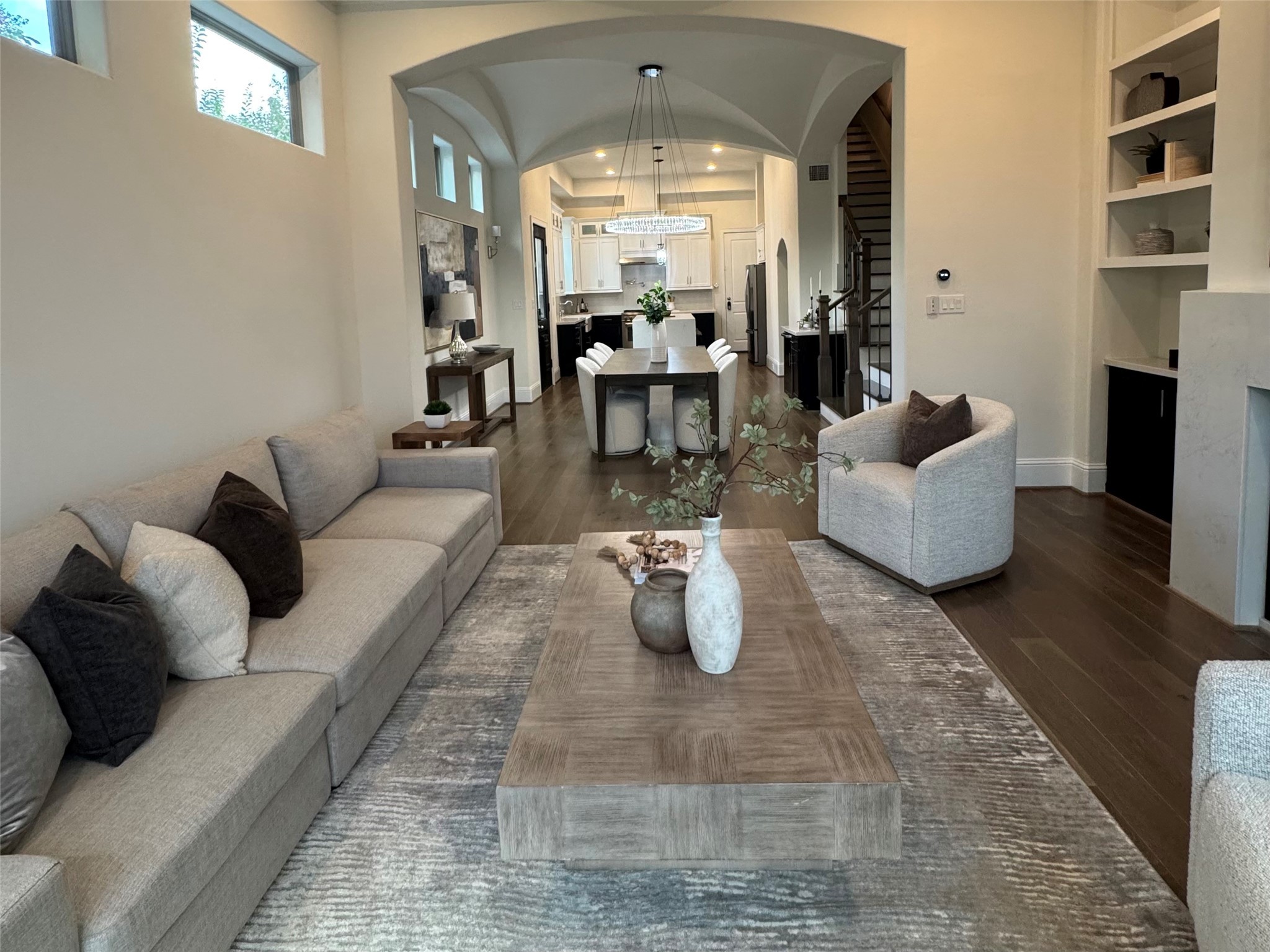 1902 West 25th Street Houston, TX 77008 - Photo 3 of 49 a living room with fireplace furniture and a chandelier