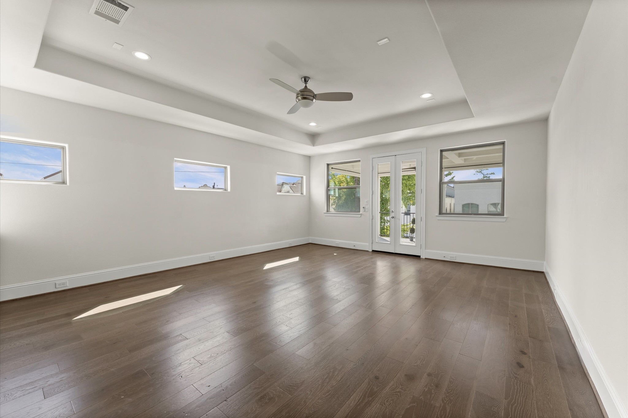 1902 West 25th Street Houston, TX 77008 - Photo 40 of 49 a view of an empty room with a window and wooden floor