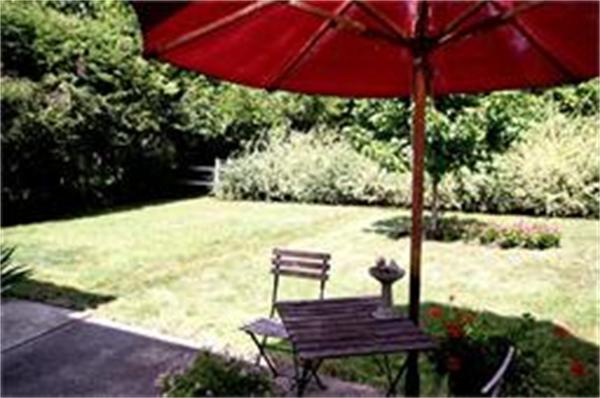 65 Shaker Road Longmeadow, MA 01106 - Photo 13 of 16 a view of a backyard with sitting area