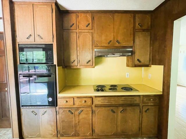 460 Massey Road Stuart, VA 24171 - Photo 7 of 24 a kitchen with stainless steel appliances granite countertop a refrigerator and a stove
