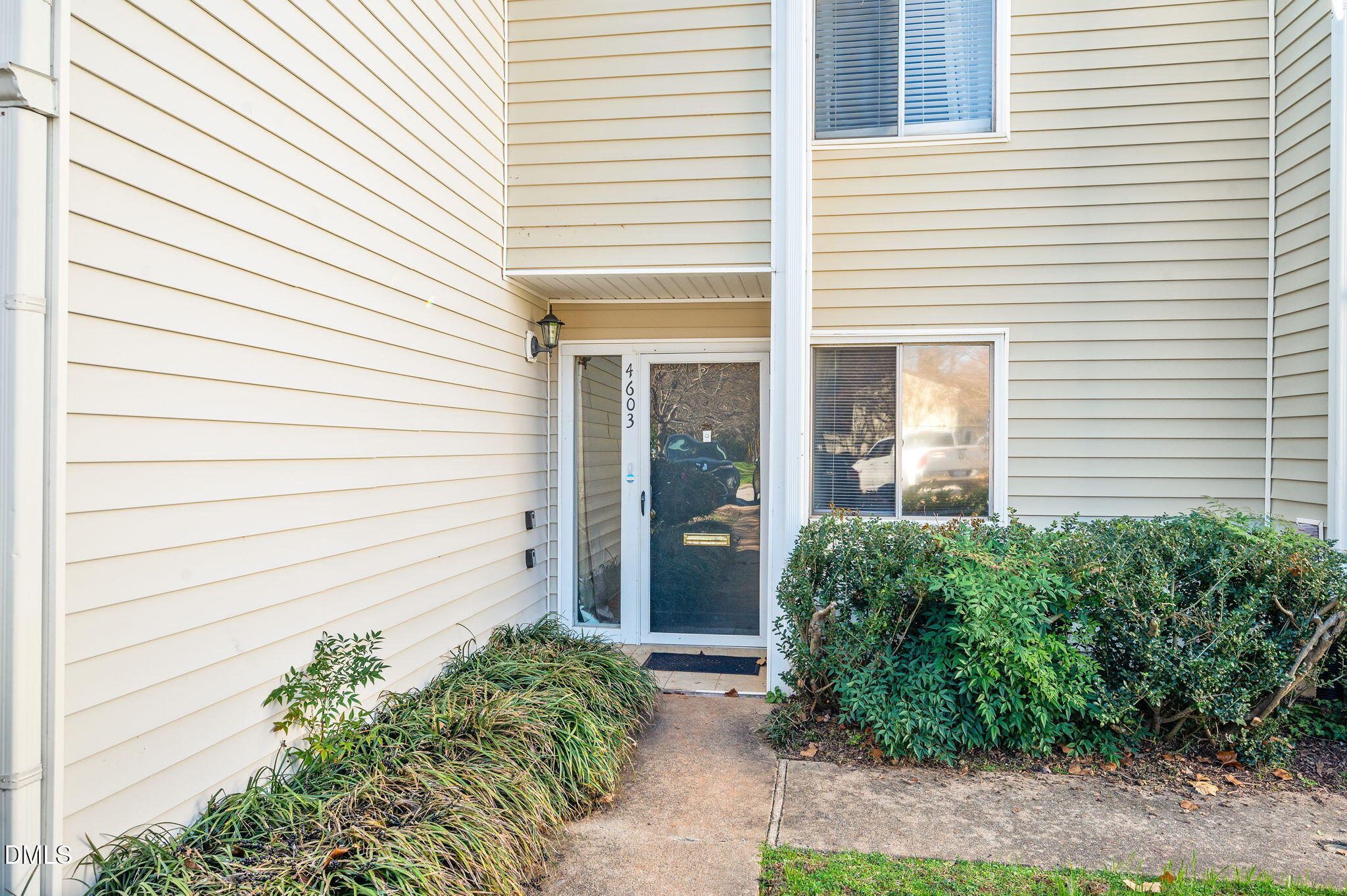 4603 Edwards Mill Road Raleigh, NC 27612 - Photo 2 of 26 a view of a house with potted plants