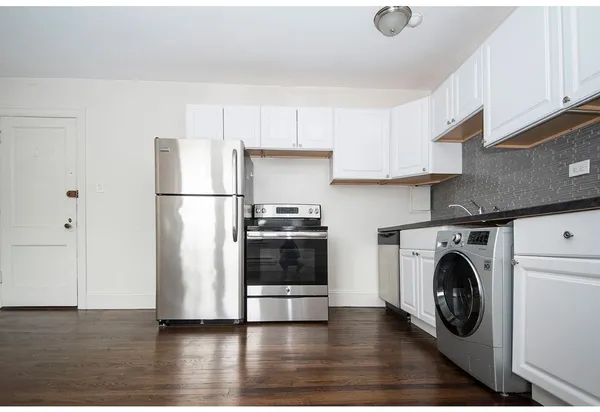 a view of kitchen with washer and dryer