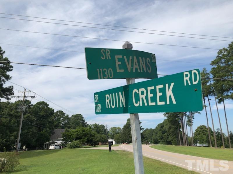 Lot Evans Road Henderson, NC 27537 - Photo 7 of 7 a street sign on a pole on a street