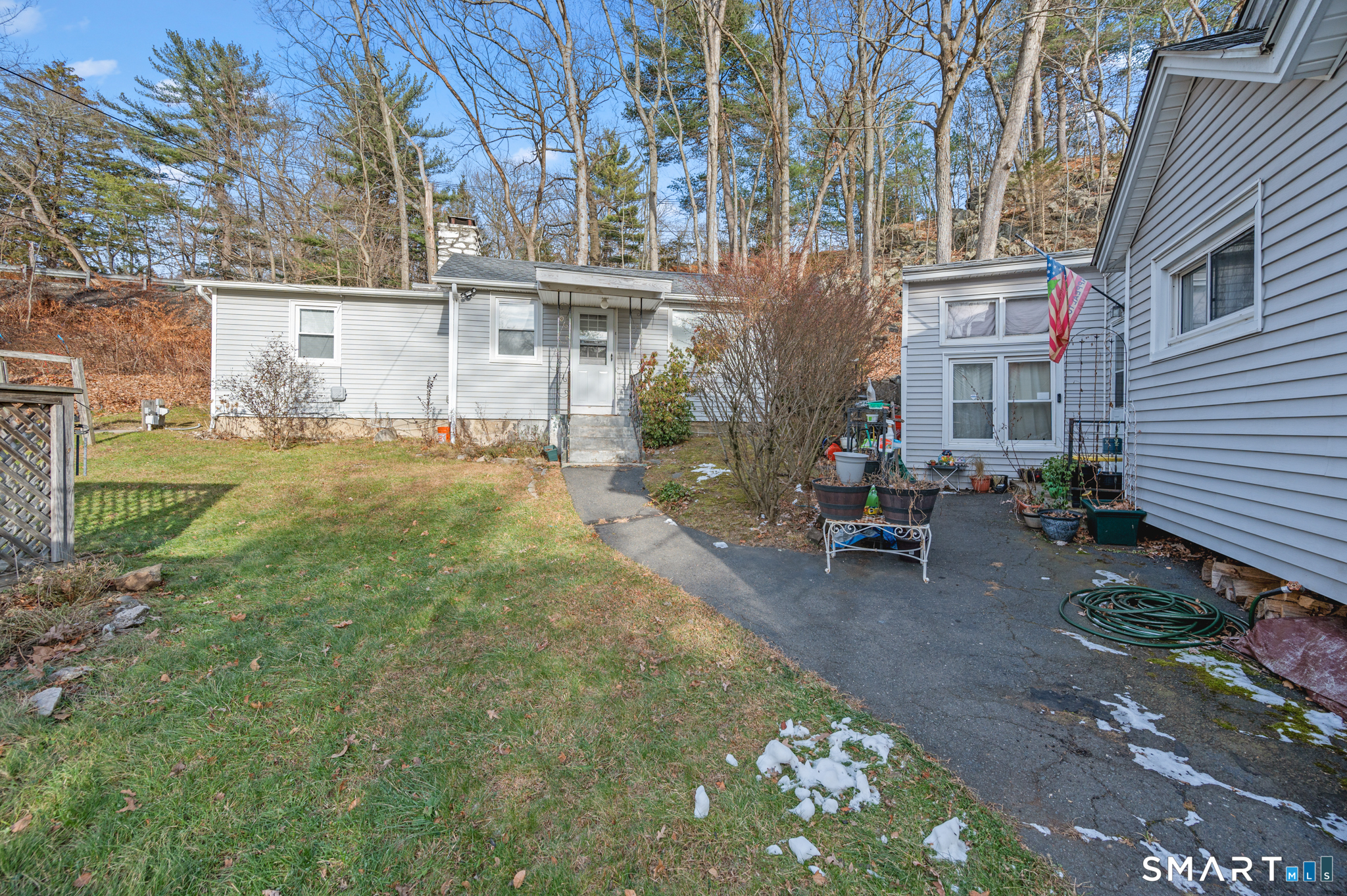 10 Old Waterbury Road Middlebury, CT 06762 - Photo 5 of 12 a view of a house with backyard and sitting area
