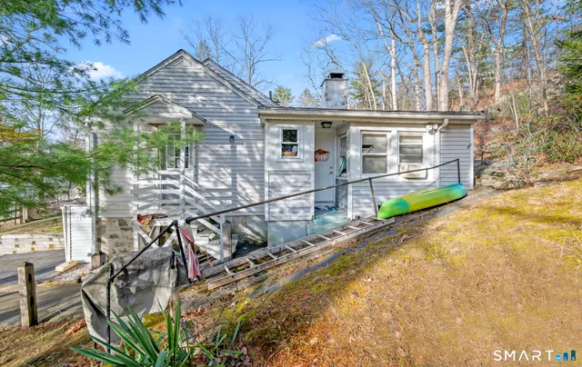 front view of house with a small yard