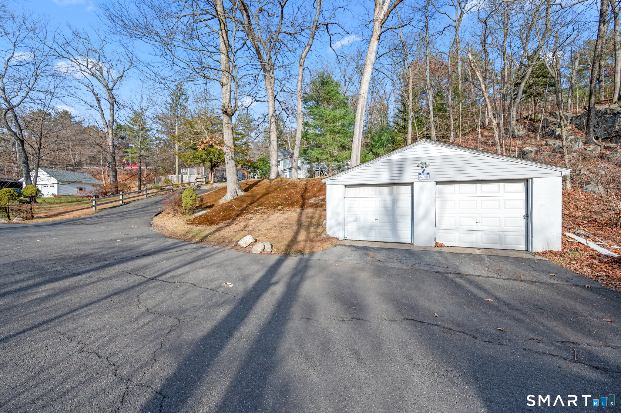 10 Old Waterbury Road Middlebury, CT 06762 - Photo 10 of 12 a view of a house with backyard and trees