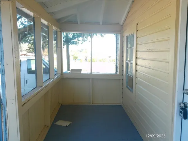 a view of walk in closet with a window