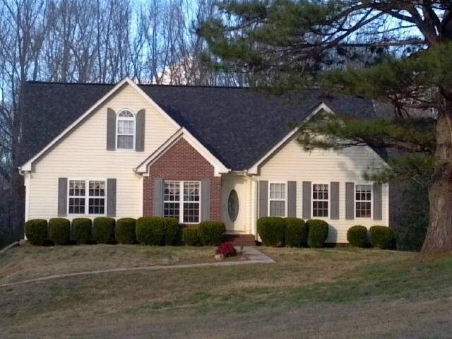 2443 Hale Place Road Northwest Monroe, GA 30656 - Photo 1 of 1 a front view of a house with a yard