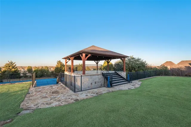 a view of a backyard with a garden