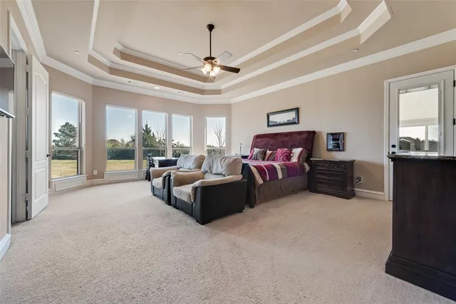a view of a livingroom with furniture and staircase