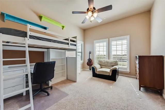 a bathroom with a sink a light fixture and a mirror