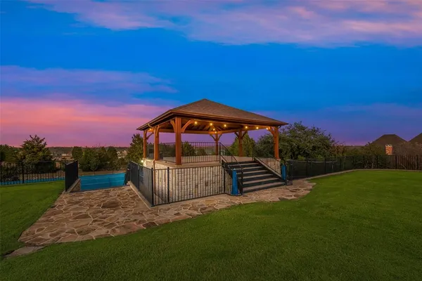 a view of a backyard with a garden