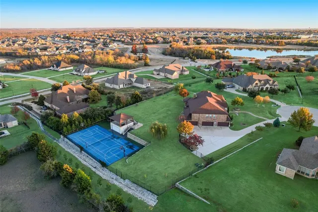 an aerial view of a house with a garden