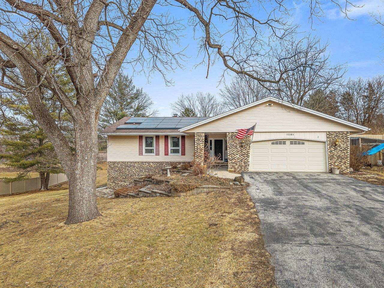 10383 Atwood Road Roscoe, IL 61073 - Photo 1 of 42 a view of house with a yard covered with snow in front of house
