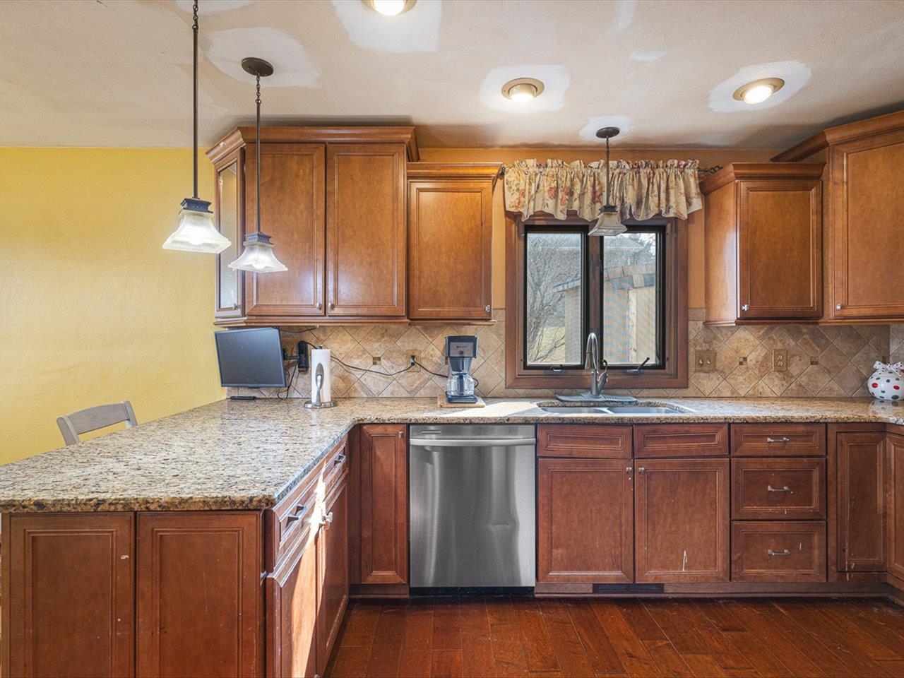 10383 Atwood Road Roscoe, IL 61073 - Photo 15 of 42 a kitchen with a sink and cabinets