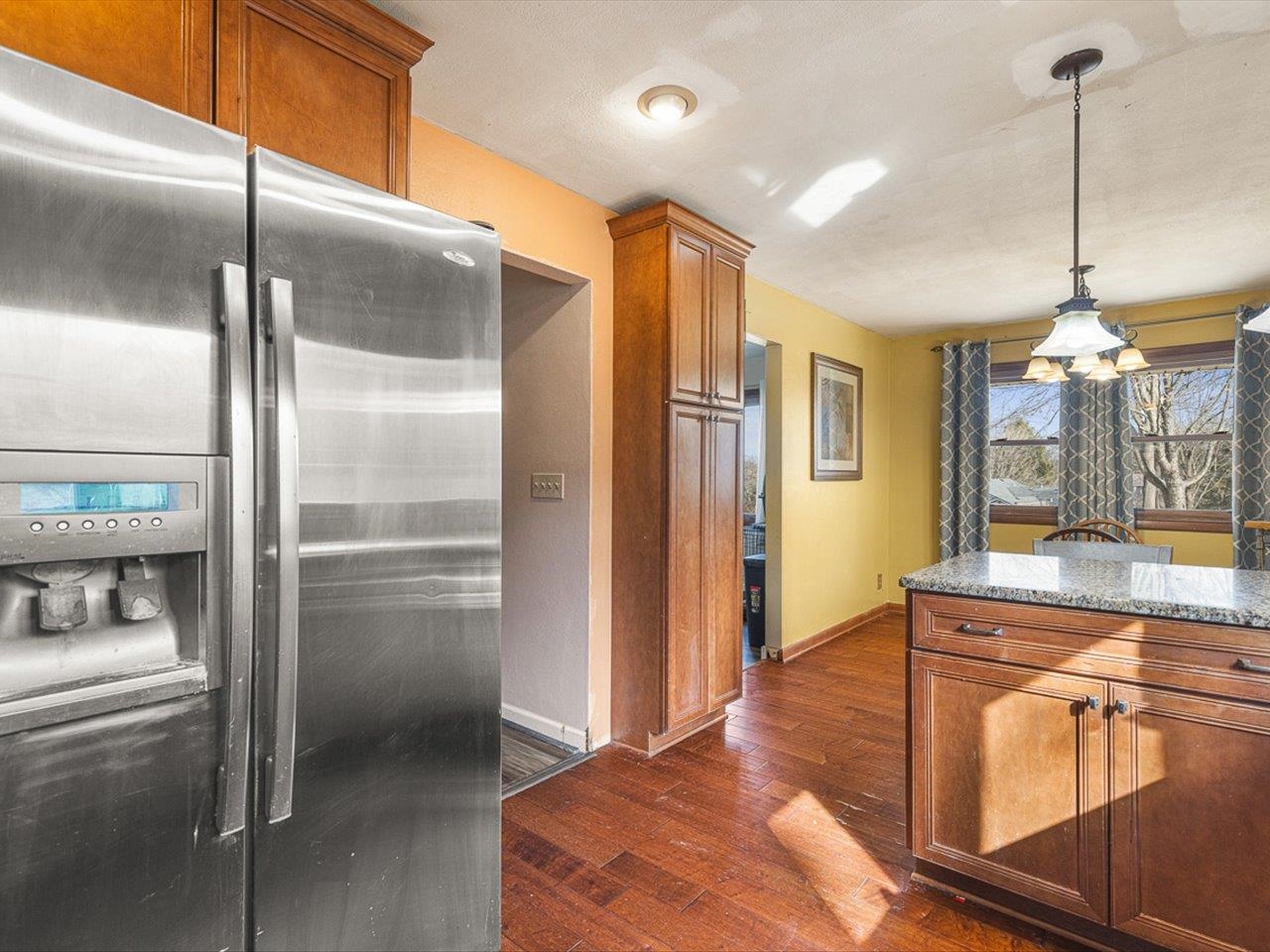 10383 Atwood Road Roscoe, IL 61073 - Photo 18 of 42 a kitchen with stainless steel appliances granite countertop a refrigerator a oven and a sink with granite countertops