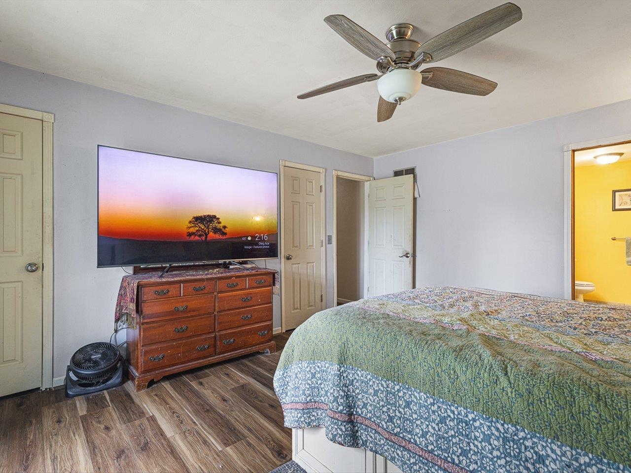 10383 Atwood Road Roscoe, IL 61073 - Photo 23 of 42 a bedroom with a bed and a flat screen tv