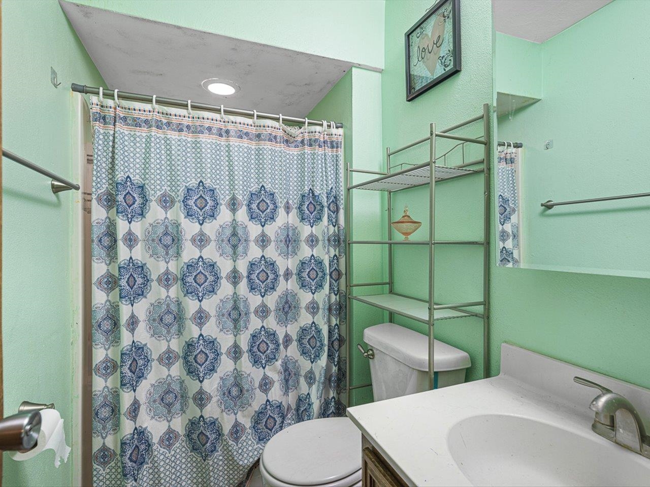10383 Atwood Road Roscoe, IL 61073 - Photo 27 of 42 a bathroom with a toilet sink and shower