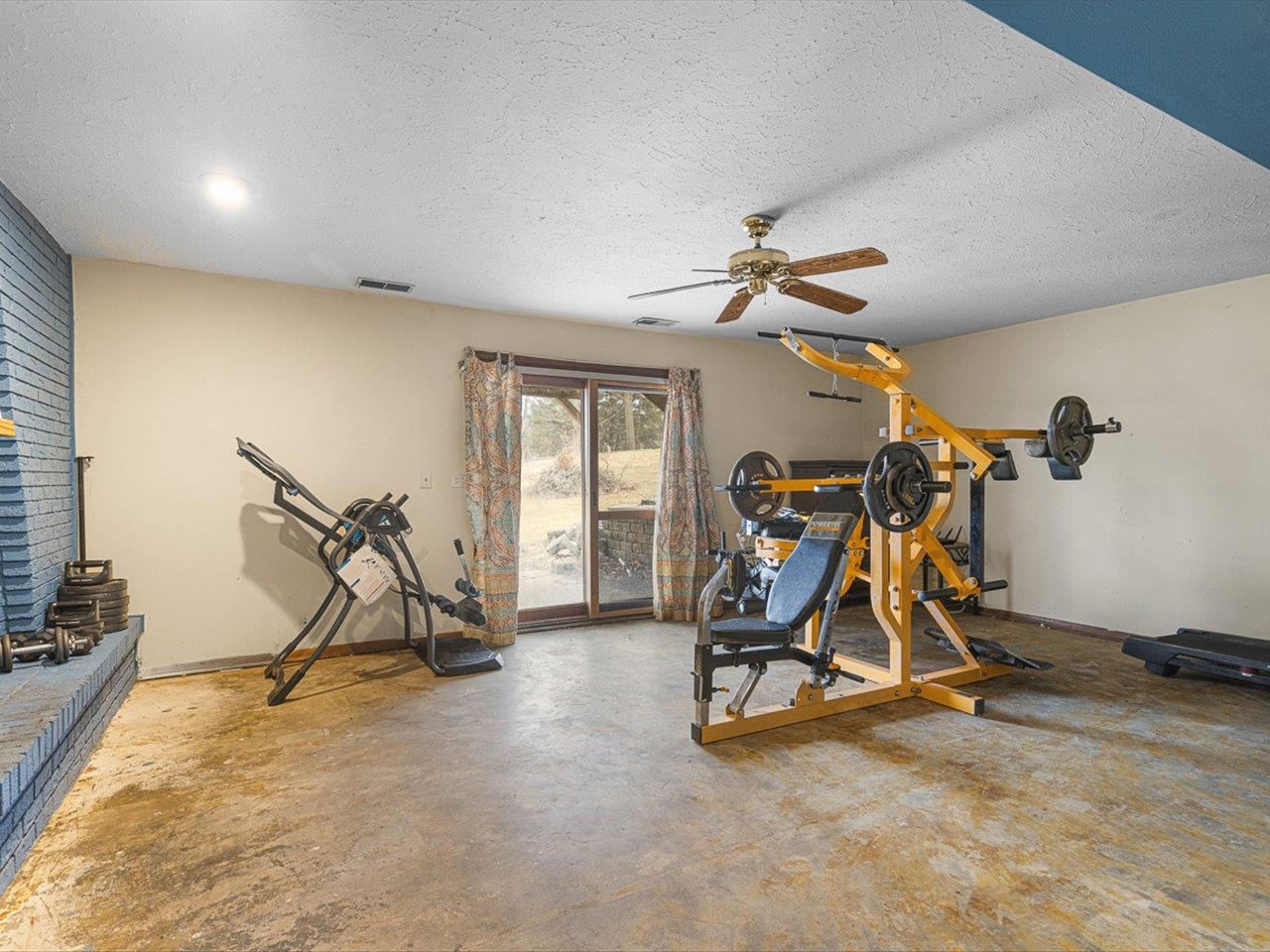 10383 Atwood Road Roscoe, IL 61073 - Photo 28 of 42 a view of a room with gym equipment